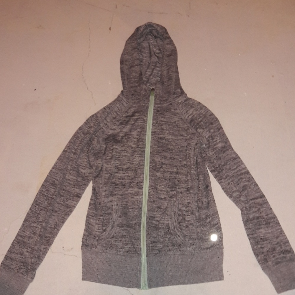 A gray and mint green jacket